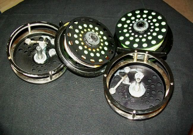 Vintage click pawl fly reels that operate with less noise